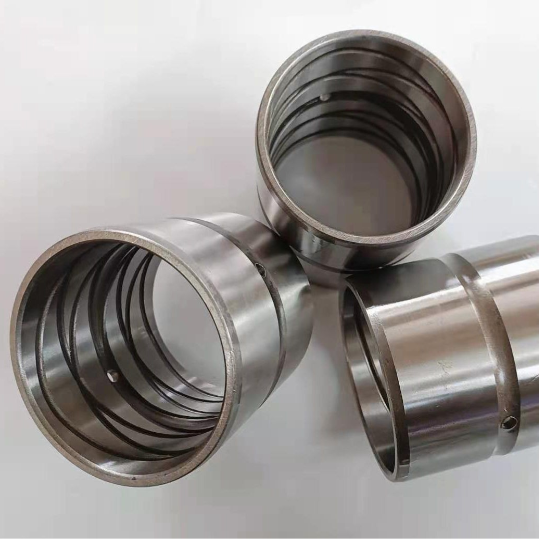 Close‑up view of excavator cylinder bushing internal grease groove & bore

